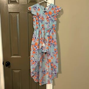 Beautiful romper with a high/low overlay